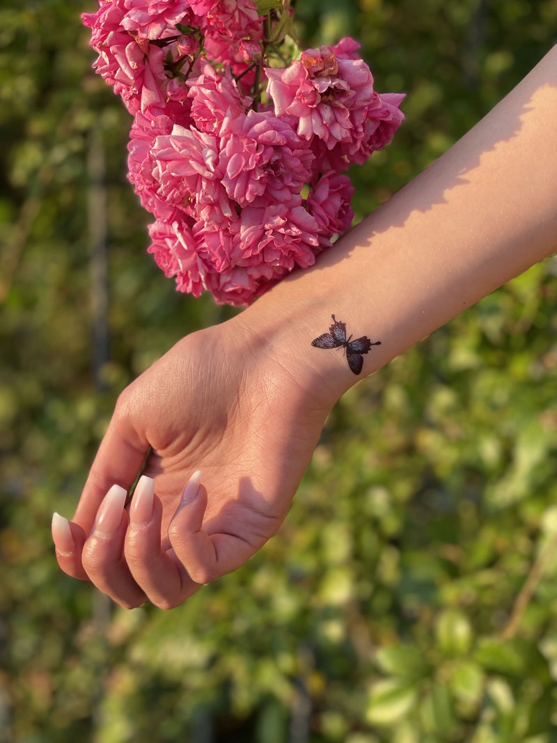 Blue flying Butterflies Tattoo